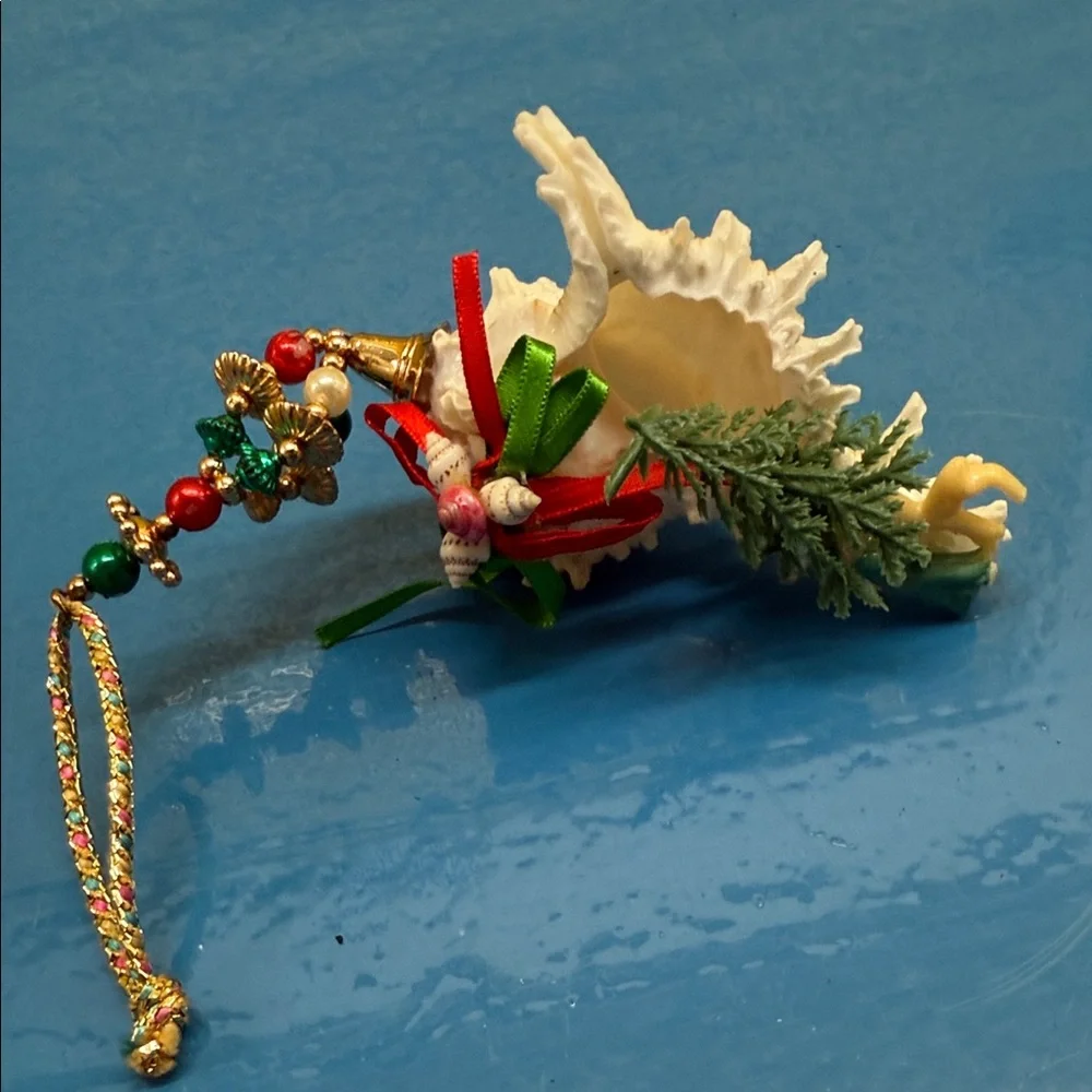 Elegant Shell Ornament with Pink and Green Accents